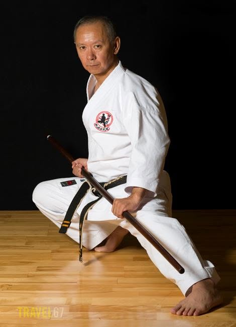 Akamine Hiroshi with a bo